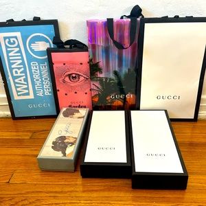 Gucci paper boxes and shopping bags